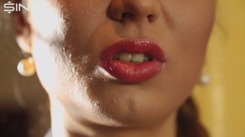 Beautiful Brunette Smiles While Enjoying A Cigarette Screencap 16 on www.sinx.com