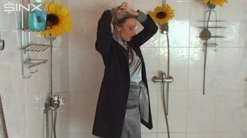 Busty Blonde Lathers Up In Clothed Shower Screencap 14 on www.sinx.com
