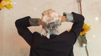 Busty Blonde Lathers Up In Clothed Shower Screencap 20 on www.sinx.com
