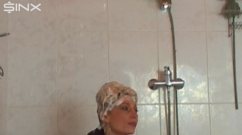 Busty Blonde Lathers Up In Clothed Shower Screencap 24 on www.sinx.com