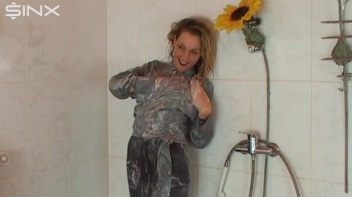 Busty Blonde Lathers Up In Clothed Shower Screencap 53 on www.sinx.com