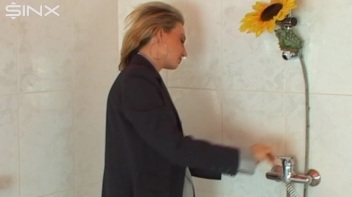 Busty Blonde Lathers Up In Clothed Shower Screencap 6 on www.sinx.com