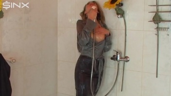 Busty Blonde Lathers Up In Clothed Shower Screencap 71 on www.sinx.com