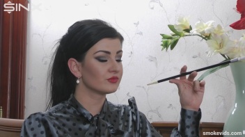 Seductress Smokes And Seduces Screencap 13 on www.sinx.com