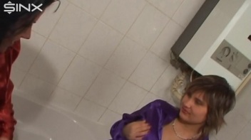 Slippery Clothed Bathtub Fun For Lesbians Screencap 8 on www.sinx.com