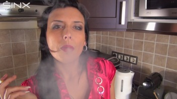 Raven Haired Hottie Smokes In The Kitchen Screencap 28 on www.sinx.com