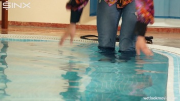 Brunette In Jeans Enters Swimming Pool Clothed Screencap 7 on www.sinx.com