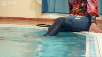 Brunette In Jeans Enters Swimming Pool Clothed Screencap 8 on www.sinx.com