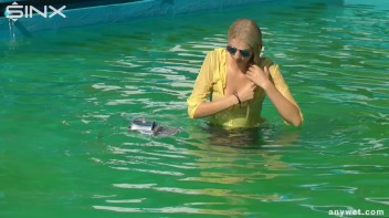 Sexy Blonde Swims And Splashes In Outdoor Pool Screencap 26 on www.sinx.com