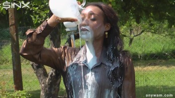 Ebony Hottie Bathes in Creamy Milk Screencap 9 on www.sinx.com