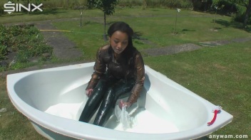 Ebony Hottie Bathes in Creamy Milk Screencap 15 on www.sinx.com