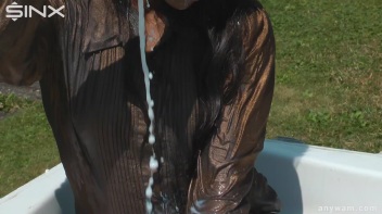 Ebony Hottie Bathes in Creamy Milk Screencap 16 on www.sinx.com