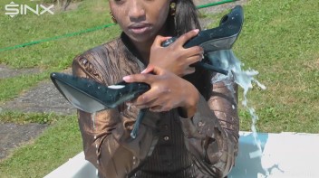 Ebony Hottie Bathes in Creamy Milk Screencap 19 on www.sinx.com