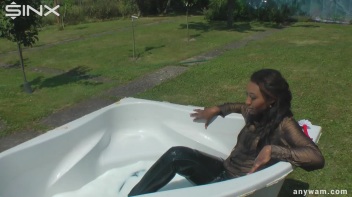 Ebony Hottie Bathes in Creamy Milk Screencap 23 on www.sinx.com