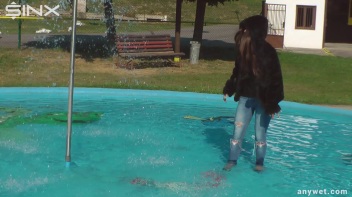 Raven Haired Hottie Soaks Herself At Waterpark Screencap 3 on www.sinx.com