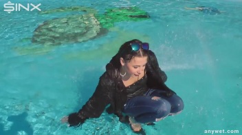 Raven Haired Hottie Soaks Herself At Waterpark Screencap 31 on www.sinx.com