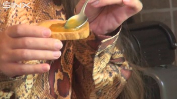 Brunette Babe Crushes Food And Licks Toes Screencap 5 on www.sinx.com