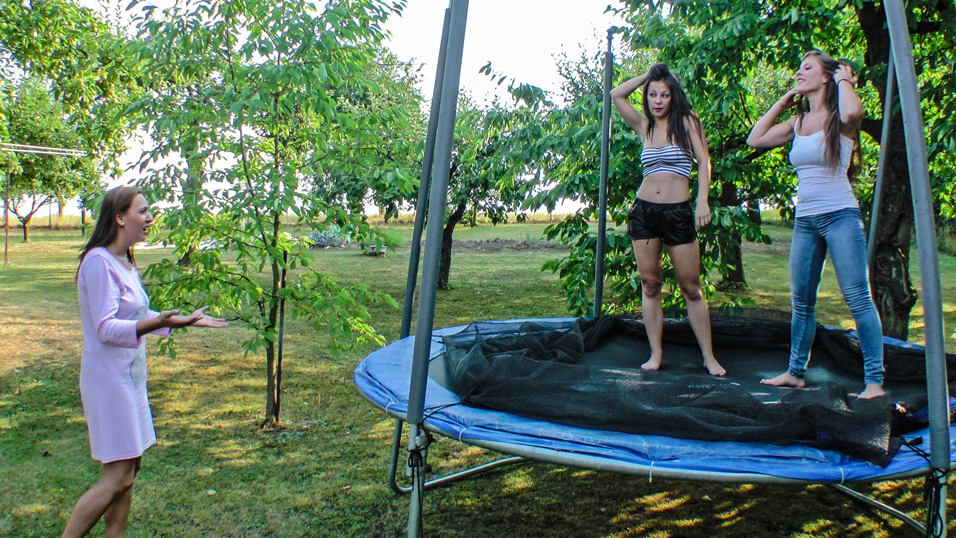 Cute Brunettes Get Drenched On Trampoline on www.sinx.com