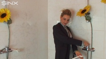 Busty Blonde Lathers Up In Clothed Shower Screencap 1 on www.sinx.com