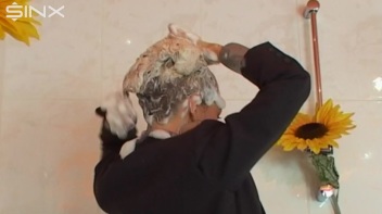 Busty Blonde Lathers Up In Clothed Shower Screencap 19 on www.sinx.com