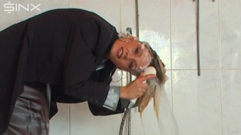 Busty Blonde Lathers Up In Clothed Shower Screencap 29 on www.sinx.com