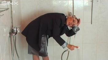 Busty Blonde Lathers Up In Clothed Shower Screencap 31 on www.sinx.com