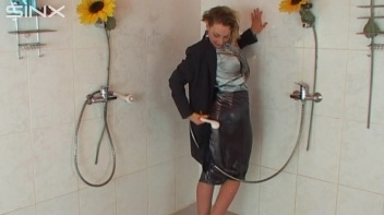 Busty Blonde Lathers Up In Clothed Shower Screencap 40 on www.sinx.com