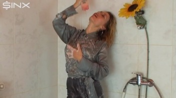 Busty Blonde Lathers Up In Clothed Shower Screencap 47 on www.sinx.com