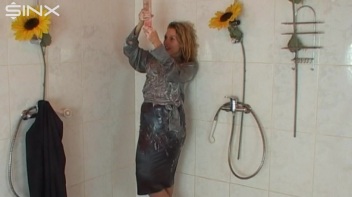 Busty Blonde Lathers Up In Clothed Shower Screencap 48 on www.sinx.com