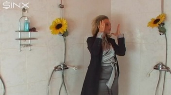 Busty Blonde Lathers Up In Clothed Shower Screencap 5 on www.sinx.com