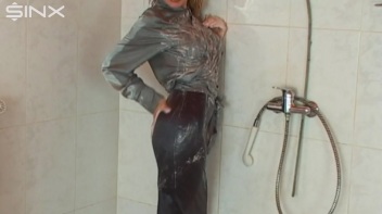 Busty Blonde Lathers Up In Clothed Shower Screencap 51 on www.sinx.com
