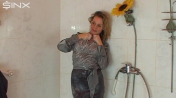 Busty Blonde Lathers Up In Clothed Shower Screencap 58 on www.sinx.com