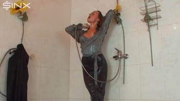 Busty Blonde Lathers Up In Clothed Shower Screencap 74 on www.sinx.com